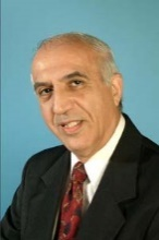 Dr Cameron K. Tebbi